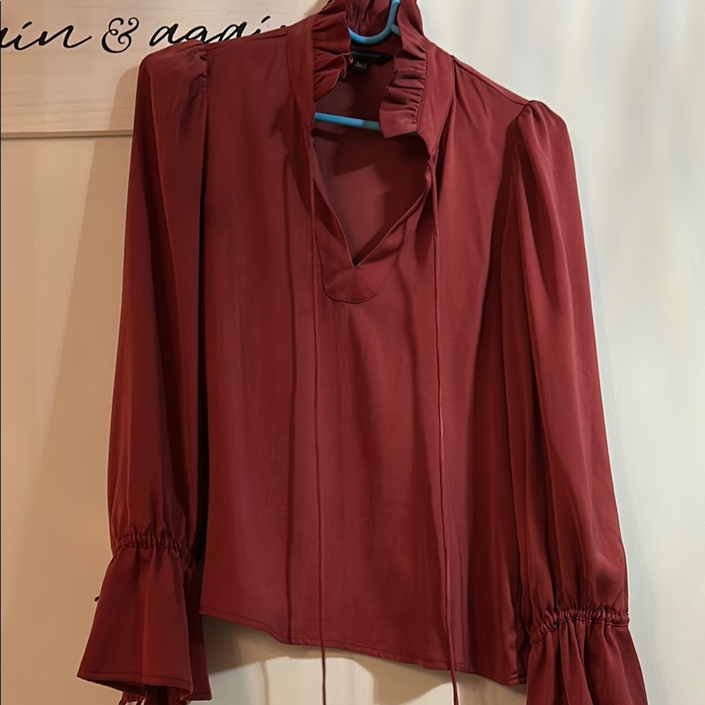 Easy to wear with any color jeans or slacks.